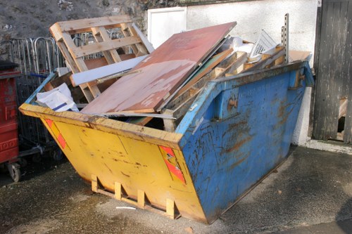 Homeowner reviewing garden clearance plan