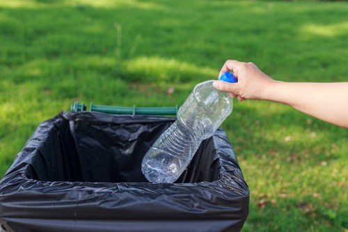 Employees participating in waste management initiatives