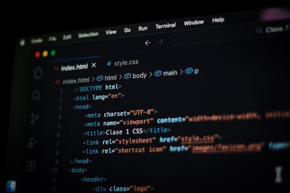 The image displays a close-up of a laptop screen showing a code editor with lines of programming code written in a language resembling JavaScript or TypeScript. The screen has a bright, high-resolutio